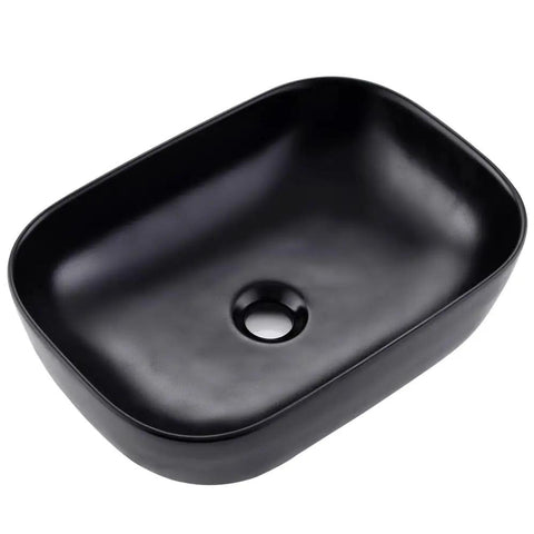 Black Rectangle Vessel Sink 18x13 Above Counter Porcelain Ceramic With Faucet And Drain Combo Dope Durable Porcelain Triple Glaze Finish Scratch Resistant Modern Bathroom Vessel Basin. Close-up view of the sink's glossy black finish.