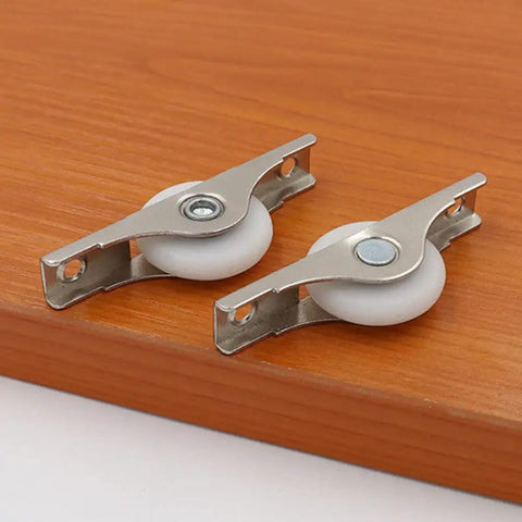 8 Pack Rock Hard Nylon Slider Wheel Replacement Pulleys for Walk in Closets Cabinet and Chiller Doors with white wheels on wood.