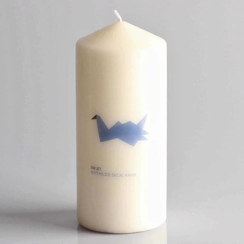 Candle featuring blue origami bird design made with Water Slide Decal Paper For Inkjet Printers Clear US Letter Size 8.5 By 11 20 Sheets