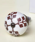 50 Pack Slick Brown Ceramic Drawer Knobs Featuring Delicate Leaf And Flower Motifs Rust Free Kitchen Cabinet Handles And Dresser Pulls No Sweat Install Kid Friendly Home Decor With Top Shelf Quality And Smooth Finish, close-up of floral design.