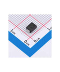 Small electronic component on graph paper, 1cm grid. Not related to Five Piece Pro Grade Drill Bit Set For Wood Metal Plastic.