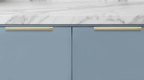 10 Pack 3-1/2 Inch Knurled Finger Edge Drawer Pulls In Diamond Gold Oxidation Finish on blue cabinet