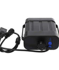 Kickass Slick IPX7 8.4V Rechargeable Battery Pack For Bikes And Cycling Headlamps Featuring Solid Waterproof Housing With Usb Output Port And Tough Bracket Mount Storage Case, showing USB output and control knob.