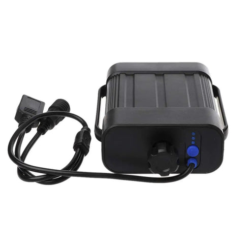 Kickass Slick IPX7 8.4V Rechargeable Battery Pack For Bikes And Cycling Headlamps Featuring Solid Waterproof Housing With Usb Output Port And Tough Bracket Mount Storage Case, showing USB output and control knob.