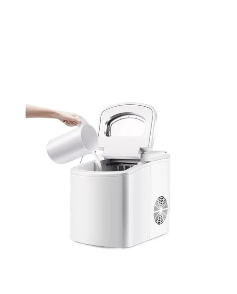 Top Shelf Compact Ice Maker For Countertops Kickin Out Twenty Six Pounds Each Day In Record Time With A Sleek White Finish pouring water.