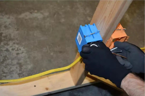 250 Ft 12-2 NM-B Romex Wire, 12 AWG Yellow Dry Location Cable being installed by electrician