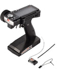 GT3B 2.4Ghz 3 Channel RC Transmitter With GR3E Receiver For Cars And Boats LCD Screen AFHDS Remote shown with components.