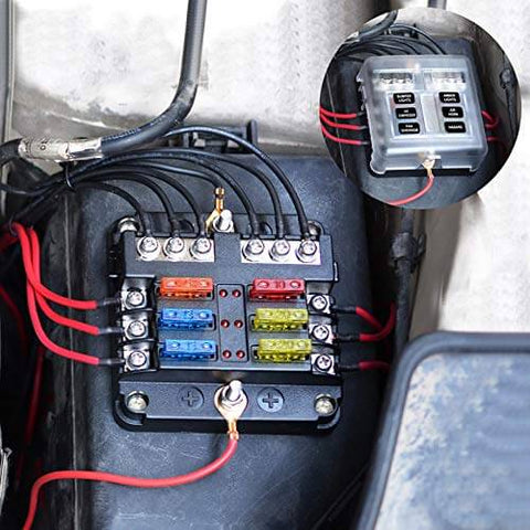 Waterproof 6 Way Fuse Block With Ground Negative Busbar, 100 Amp Max, LED Indicator, 12-24V DC, installed in a vehicle