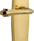 Prairie Plate Privacy Fleur Door Lever Set In Unlacquered Brass featuring solid forged brass build and pre-mounted levers