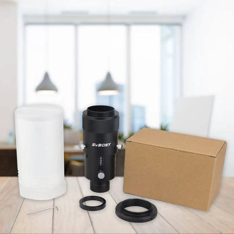 Prime Focus Telescope Camera Adapter Kit For Canon EOS Rebel DSLR Cameras with components on a desk, includes 1.25 Eyepiece.