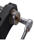 Close-up of digital Brinell hardness tester impact pin hammer durometer for precise readings on steel and cast iron.
