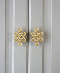 Chinese Knot Cabinet Pull Handle With Single Hole Design For Wardrobes Cabinets And Dressers Easy Install, gold knob on gray cabinet.