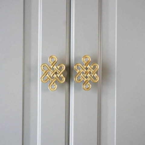 Chinese Knot Cabinet Pull Handle With Single Hole Design For Wardrobes Cabinets And Dressers Easy Install, gold knob on gray cabinet.