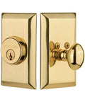 Solid Brass Studio Plate Single Cylinder Deadbolt In Polished Brass Heavy Duty Door Lockset with knobs and screws visible