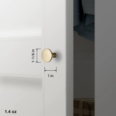 Champagne Bronze Kitchen Cabinet Knobs 6 Pack Round Modern Hardware For Cabinets And Dressers One And One Eighth Inch Diameter Fingerprint Resistant Brushed Finish Easy Install Chic Minimalist Look For Any Room. Shown installed on white cabinet with size measurements, featuring champagne bronze finish.