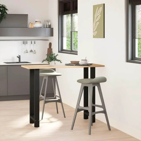 Adjustable Metal Table Legs Pack Of Two Sturdy Steel Bases With Self Leveling Floor Savers in modern kitchen setting.