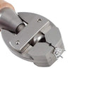 Solid Adjustable Hand Vise With Rotating Hardwood Handle That Snaps Securely And Grips Steady On Small Crafts Or Diy Builds Without Breaking A Sweat In Your Garage, showing jaws gripping small metal parts.