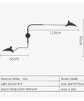 Slick Adjustable Double Head Wall Sconce Lamp In Modern Black Finish With Swivel Pole Design, dimensions 120x65x45cm for cozy bedroom decor.