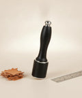 Tough As Nails Nylon Carving Hammer For Leather Tooling And Die Stamping Go To Mallet With Locked Grip Solid Face next to leather pieces and ruler.