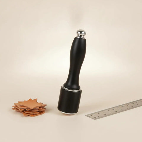 Tough As Nails Nylon Carving Hammer For Leather Tooling And Die Stamping Go To Mallet With Locked Grip Solid Face next to leather pieces and ruler.