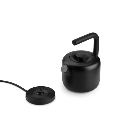Side view of Electric Kettle 1.5 Liter Capacity In Sleek Stainless Steel, Modern Twist On Stovetop Style That Is Game Changing For Quick Brews Of Tea Coffee Oatmeal Ramen And More, Large Capacity All Purpose Kettle For Home Kitchen in matte black.
