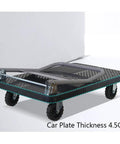 Heavy Duty Folding Platform Trolley On Wheels, rugged utility cart with folded handle, textured surface for garage and warehouse use.