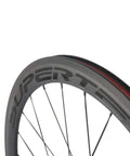 Close-up of 50mm 23mm Carbon Road Wheelset 700c Clincher for Aero Performance, showing sleek matte 3K braking surface, V brake ready