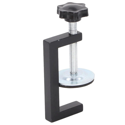 Heavy Duty 4 Piece Woodworking C Clamps Offer Killer Grip And Smooth Turn Adjustment For Straight Up Diy Projects Plus Workshop Job Site Tasks That Demand Reliable Wood Fixing Power Without Any Sweat Or Setup Hassles At All - close-up of a black C clamp with a threaded screw and metal base.