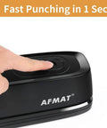Electric 3 Hole Punch For Binders, 20 Sheet Capacity, Quick Start Button close-up, finger pressing button