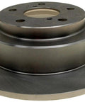 Disc brake rotor front view; machined metal rotor with central hub and bolt holes.
