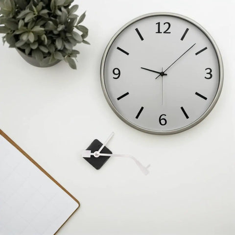 Vinyl Record Clock Mechanism Replacement Kit with Precise Timekeeping and Durable Hands next to wall clock on white surface