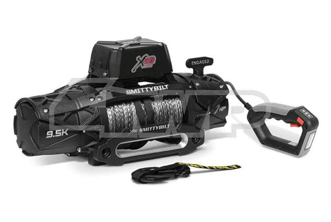 XRC Gen 3 9500 LB Off Road Winch With Synthetic Rope 7 HP Motor Delivers Faster Line Speed Lower Amp Draw With Remote Built In Flashlight For Easy Recovery On Dark Trails on black winch with remote