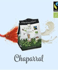 Package of Puro Fairtrade 10-count organic coffee capsules with a nature-themed design, Chili pepper and cream splash background.