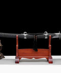 Hand Forged Qing Dynasty Dao Sword With High Manganese Steel Blade And Alloy Fittings Wood Scabbard Wrapped In Faux Leather on stand
