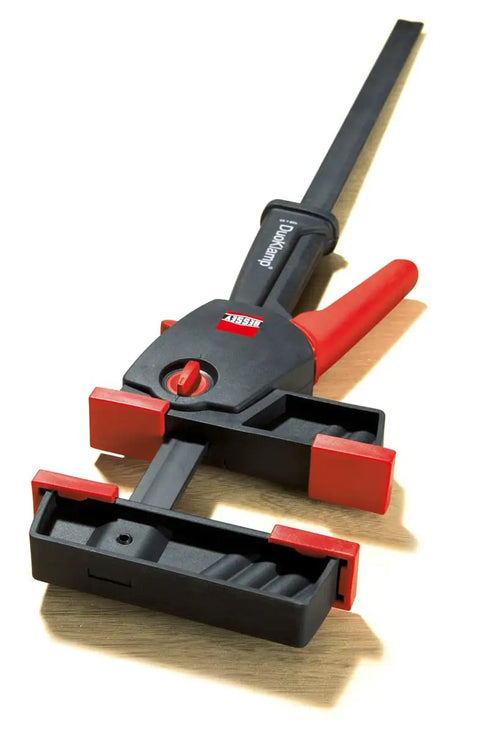 No Sweat One Hand Clamp And Spreader For Tough Woodworking 18 Inch Span, featuring red accents and quick twist dial.