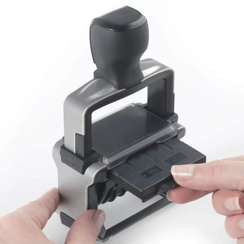 Top Shelf Self Inking Date Stamp With Custom Text And Up To Four Lines For Real Bosses Who Want Legit Office Gear showing a hand changing the ink pad.