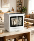 Crisp White Compact Countertop Dishwasher Boasting 28 Item Capacity Ideal For Apartments And Digs on kitchen countertop with dishes inside.