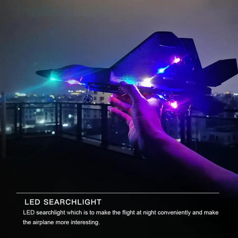 Hand holding F22 Raptor RC Plane With LED Lights 4CH 3D 6G Gyro 2.4GHz Remote Control Fighter Jet Beginner Friendly Outdoor RC Aircraft
