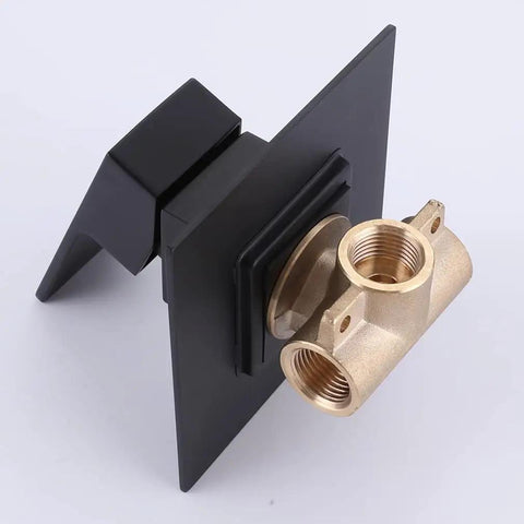 Matte Black 2 Handles Tub and Shower Faucet Set With Tub Spout, Valve Included, close-up on brass valve and wall mount trim.
