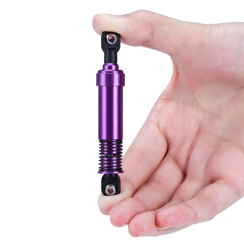 Purple 85mm aluminum big bore shock for 1/10 RC crawler LCG chassis in hand