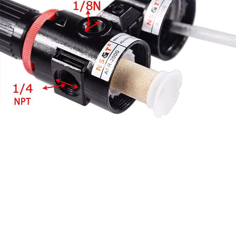 Close-up of Plug And Play Pneumatic Air Filter Regulator Kit With Gauge And Lubricator Cup showing 1/4 inch NPT connector details