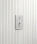 Traditional Classic Leather Texture Vinyl Wallpaper Durable Type Two Commercial Wallcovering on lightly textured striped wall.