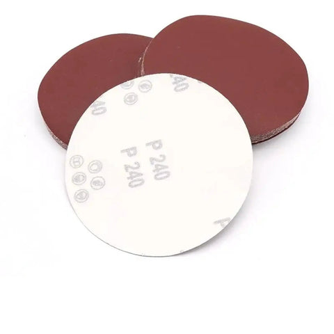 Grab These 15 Pack 6 Inch Grit 60 To 5000 Hook Loop Sanding Paper Discs For Heavy Duty Wood Metal Smoothing And Polishing Projects That Really Pop, showing two red and one white sanding disc.