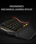 Compact 35 Key Mechanical Gaming Keyboard With Ergonomic Wrist Rest And Snappy One Handed Keypad, black design, RGB lighting features.