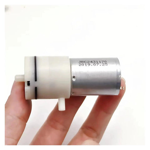 Straight Up Compact Mini Vacuum Pump With Dc6v Diaphragm Build For Steady Negative Pressure Tasks Ultra Quiet Drive and Zero Drama Assembly Right Out The Box Today motor held in hand