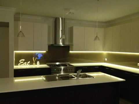 Modern kitchen with LED strip lighting controlled by Mini PIR Motion Sensor Switch For DIY LED Lighting, Occupancy Sensor, DC 12V To 24V.
