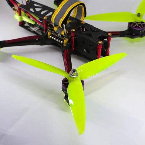 8 Pack 3 Blade High Speed Drone Propellers For Racing FPV Drones, 7 Inch 180mm CW CCW attached to drone, yellow propeller