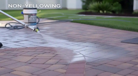 Applying Straight Up Hella Durable Crystal Clear Paver Sealer And Concrete Masonry Guard Water Based Acrylic Coating on pavers.