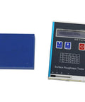 Digital Roughness Tester Profilometer For Metal And Non Metal Surfaces With Evaluation Lengths 1.25 4.0 5.0 Millimeters Ra Rq 0.05 To 15.0 Micrometers Rz Rt 0.1 To 50.0 Micrometers USB Charging Display Workhorse Tool next to a blue calibration block