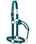 Adjustable Nylon Horse Halter For Weanlings And Ponies Durable Nylon With Triple Ply Cheek Box Stitch Reinforcement Built To Last Heavy Duty Brass Hardware Secure Fit Black, shown in blue with brass hardware.